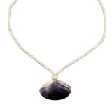 Necklace with a purple and white shell pendant on a white background