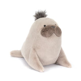 Plush toy sea lion on a white background