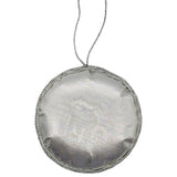 Silver fabric ornament on a white background