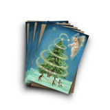 A stack of Christmas greeting cards featuring an illustration of a glowing Christmas tree with a sparkling spiral, a light-up bear faerie, and small rabbits in a snowy scene, shown on a white background.