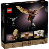 LEGO set packaging with flying machine model and product images on a dark background
