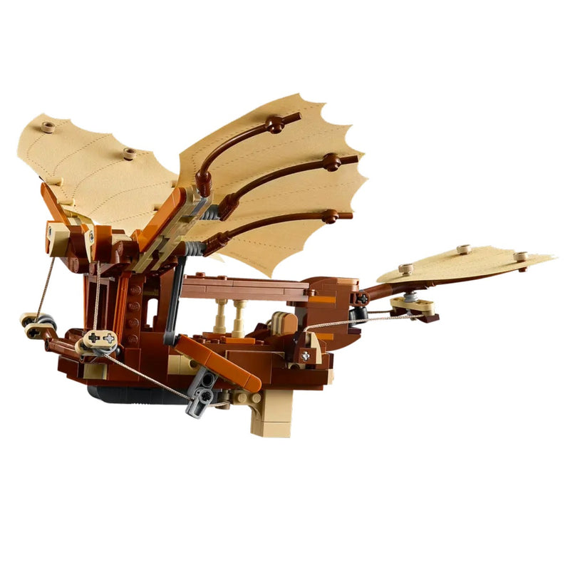 Model of a flying machine made from building blocks on a white background