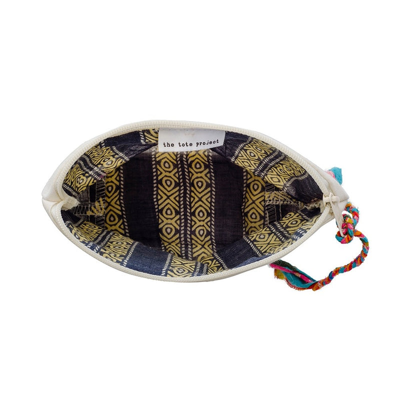 Decorative pouch with tribal patterns and colorful drawstring on a white background