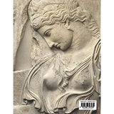 Stone carving of a classical woman's face on a book cover