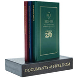 Three books titled 'The Declaration of Independence', 'The Bill of Rights', and 'The Constitution' on a box with 'Documents of Freedom' branding.