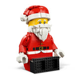 A LEGO Santa minifigure with a red suit, white beard and hat trim, yellow face, and black pants, shown on a clean white background.