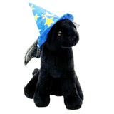 A black plush toy cat wearing a blue wizard hat with yellow stars and small gray wings, photographed on a plain white background.
