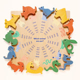 Wooden animal puzzle with a calendar on a white background