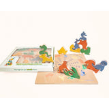 A children's wooden zodiac animal set with colorful animal pieces and a board, shown with its storage box on a plain light background.