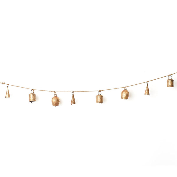 Decorative string of gold bells on a white background