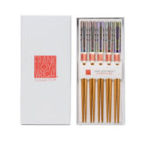 Set of chopsticks in a Frank Lloyd Wright Collection box on a white background
