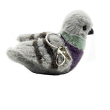 Plush pigeon keychain with a colorful body on a white background